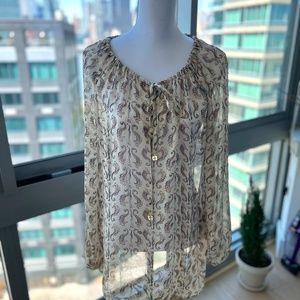 Tory Burch , flirty, featherweight silk,  drawstring neck blouse in size 14